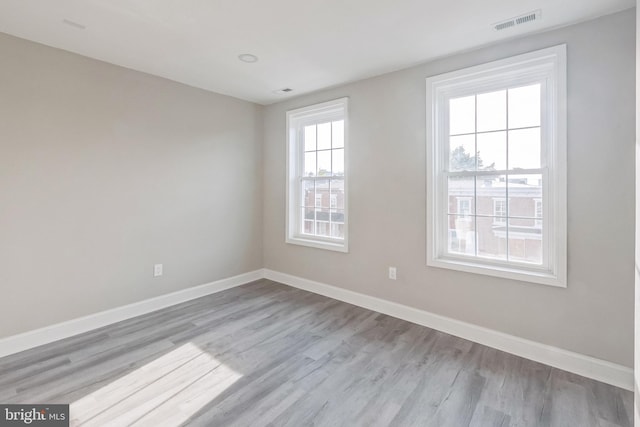 empty room featuring light wood-type flooring