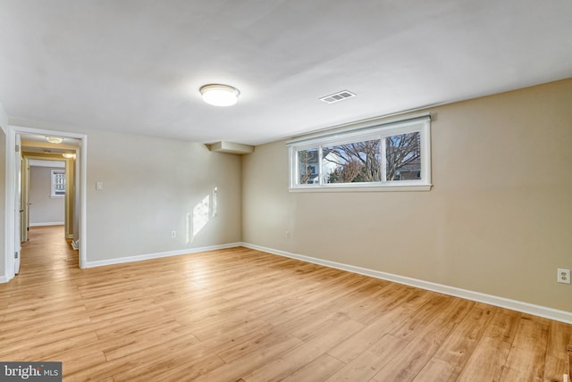 unfurnished room featuring light hardwood / wood-style floors