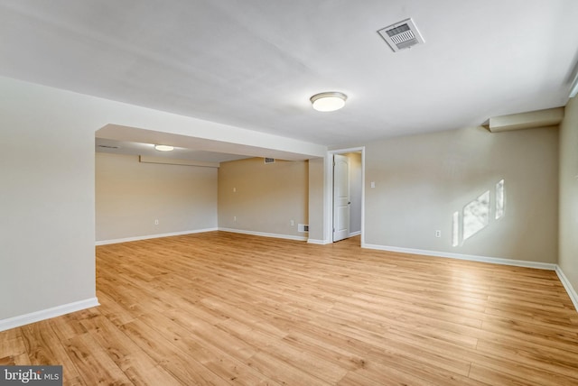 spare room featuring light hardwood / wood-style flooring