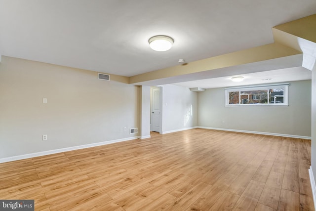 basement with light wood-type flooring