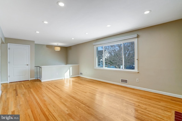 empty room with light wood-type flooring