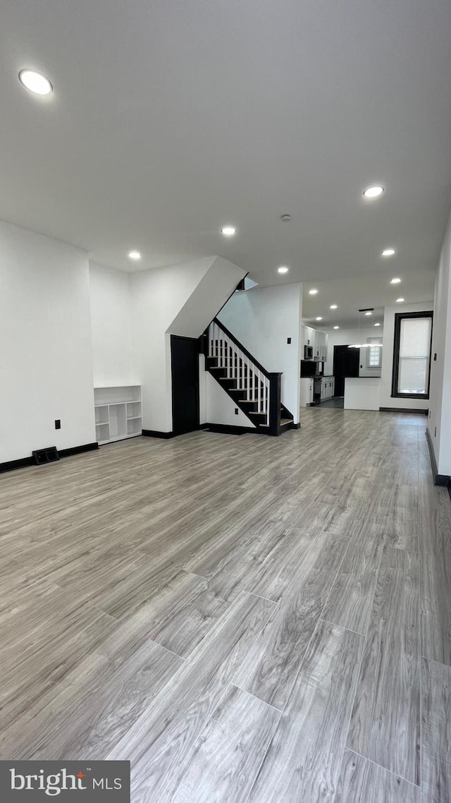 interior space with light hardwood / wood-style flooring