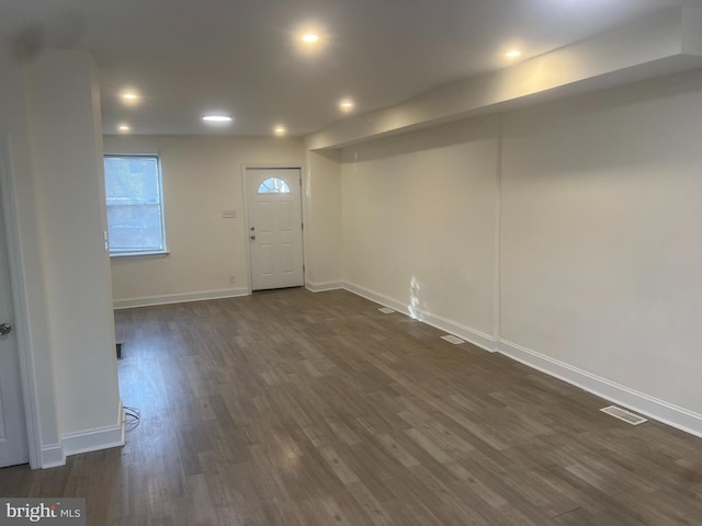 foyer featuring dark hardwood / wood-style floors