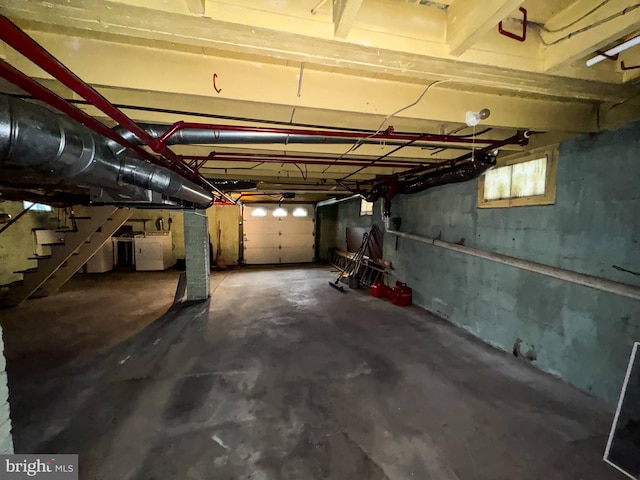 garage featuring washer and dryer