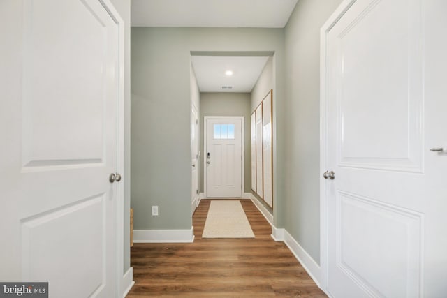 doorway featuring dark hardwood / wood-style flooring