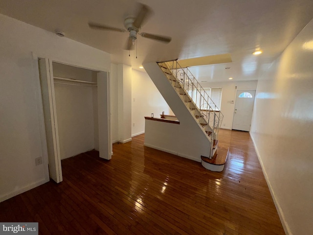 interior space with hardwood / wood-style flooring and ceiling fan