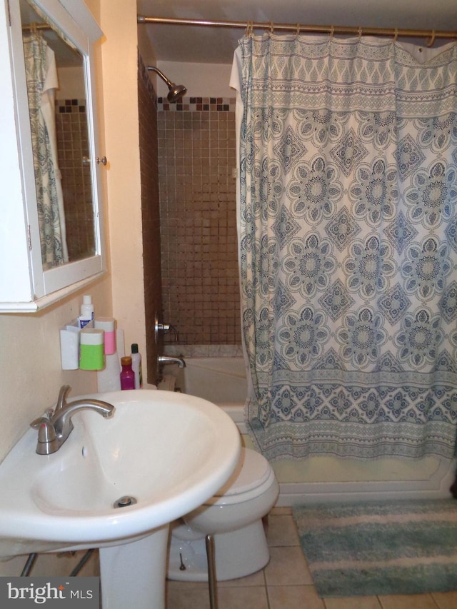 bathroom with tile patterned flooring