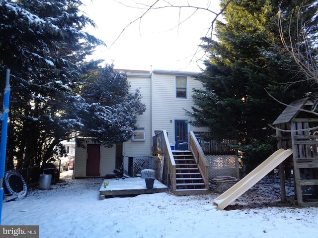 view of snow covered house