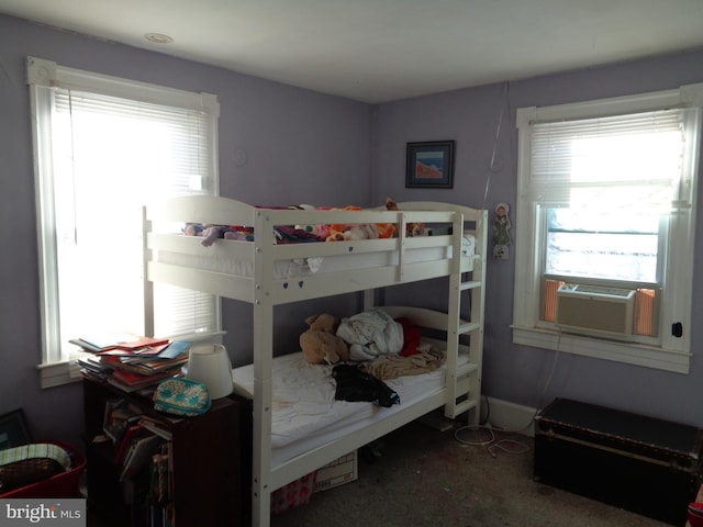 carpeted bedroom featuring cooling unit