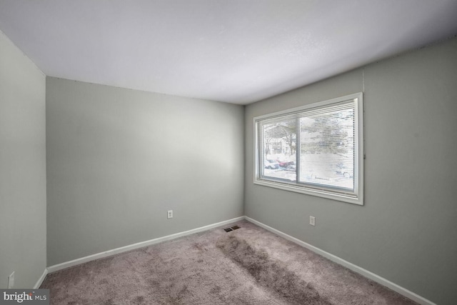 empty room with carpet floors