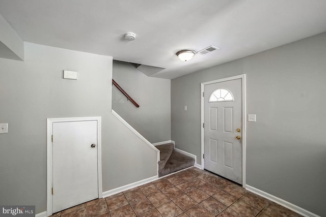 view of tiled foyer entrance