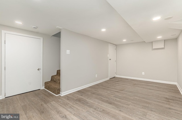 basement with light wood-type flooring