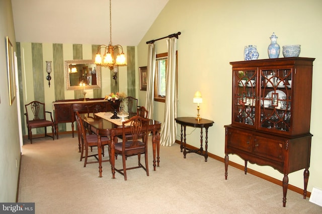 dining space with light colored carpet, vaulted ceiling, and a notable chandelier