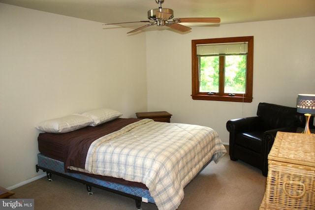 bedroom with ceiling fan and carpet