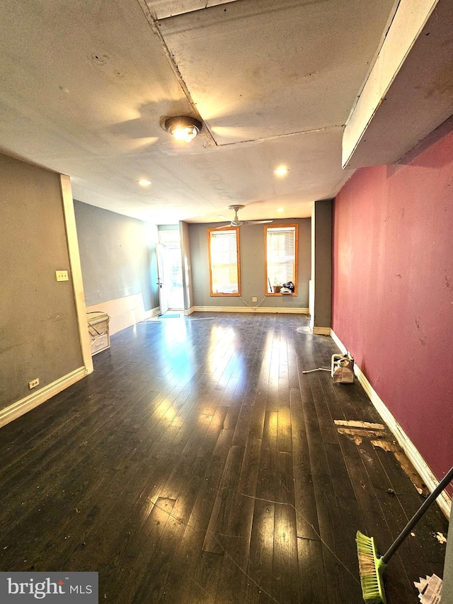 spare room featuring dark hardwood / wood-style flooring