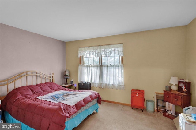 bedroom with light carpet