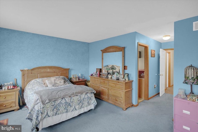 bedroom featuring light carpet