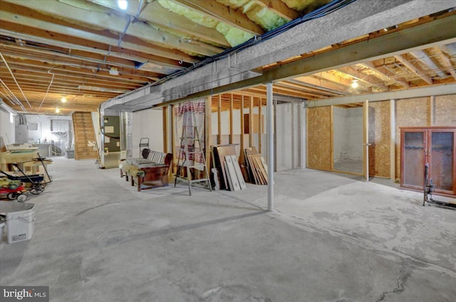 basement featuring heating unit