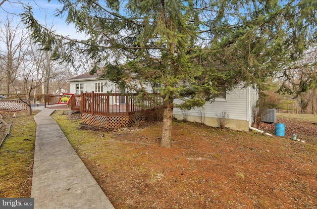 view of yard with a deck