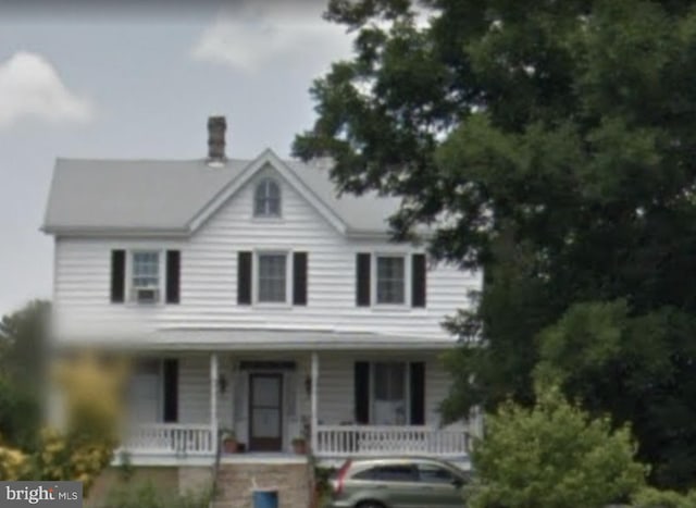 view of front of house with covered porch