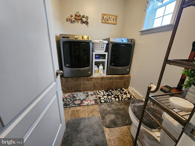 laundry room featuring washer and dryer