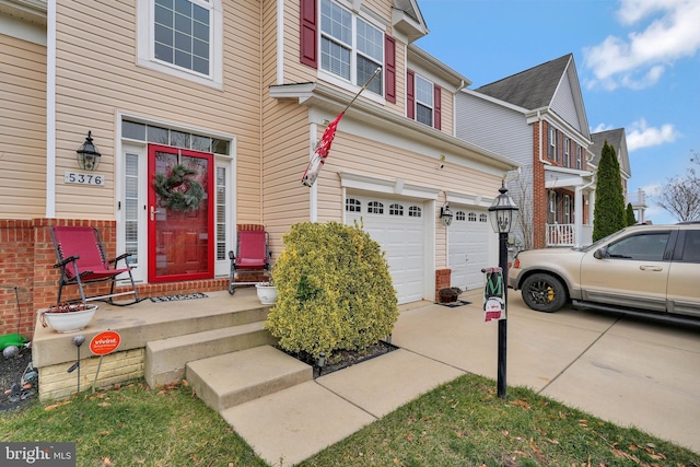 property entrance with a garage