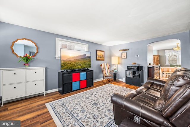 living room with dark wood-type flooring