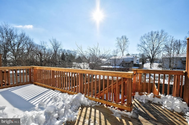 view of snow covered deck