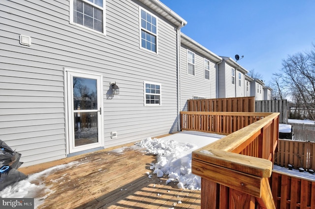 view of snow covered deck