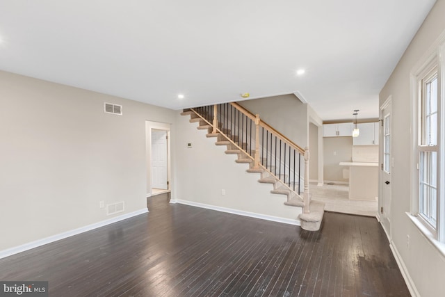 interior space featuring dark hardwood / wood-style flooring