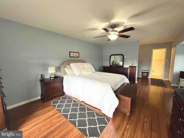 bedroom featuring hardwood / wood-style floors and ceiling fan