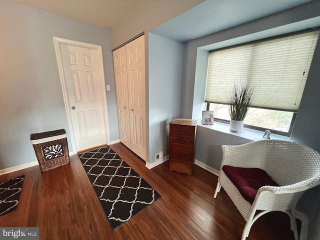 living area featuring dark hardwood / wood-style floors