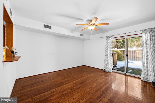 unfurnished room with ceiling fan and hardwood / wood-style floors