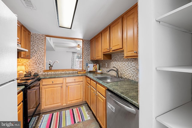 kitchen featuring tasteful backsplash, stainless steel dishwasher, ceiling fan, sink, and black range with electric stovetop