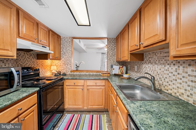 kitchen featuring tasteful backsplash, ceiling fan, black electric range, and sink