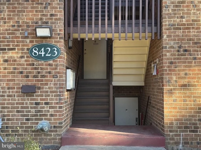 doorway to property featuring a balcony