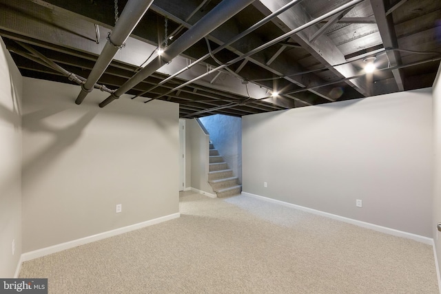 basement featuring carpet flooring