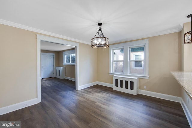 unfurnished dining area with a chandelier, dark wood-type flooring, and ornamental molding