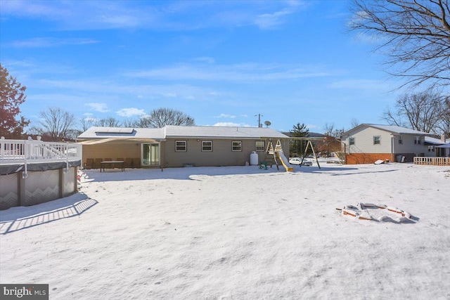 view of snow covered property