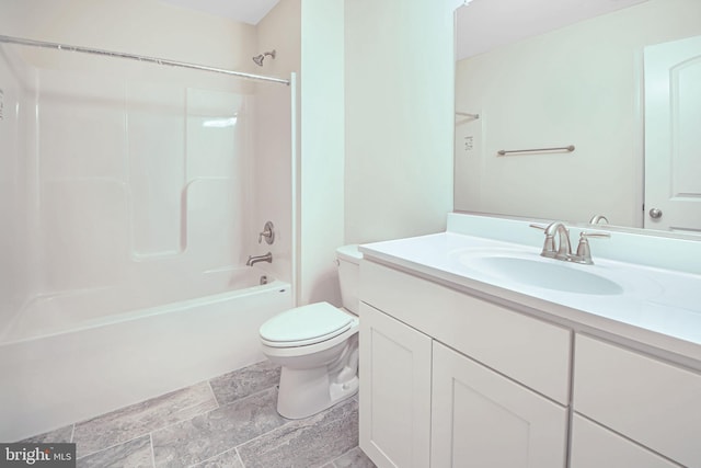 full bathroom featuring vanity, shower / bath combination, and toilet