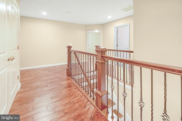 hall with light wood-type flooring