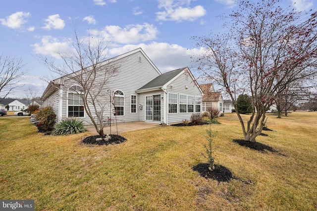 136 Sandpiper Ln, West Deptford, NJ 08086 - rear view of property with a lawn and a patio