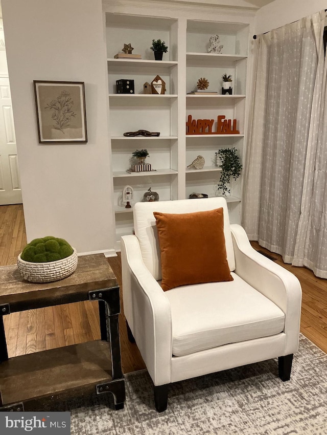 sitting room featuring hardwood / wood-style flooring