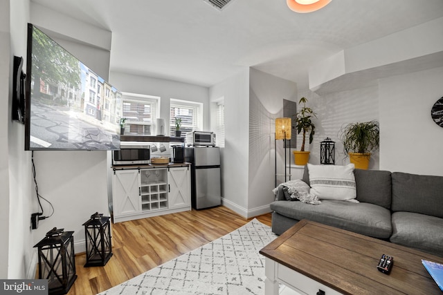 living room with light wood-type flooring