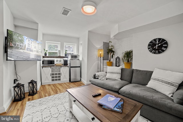 living room featuring light hardwood / wood-style floors