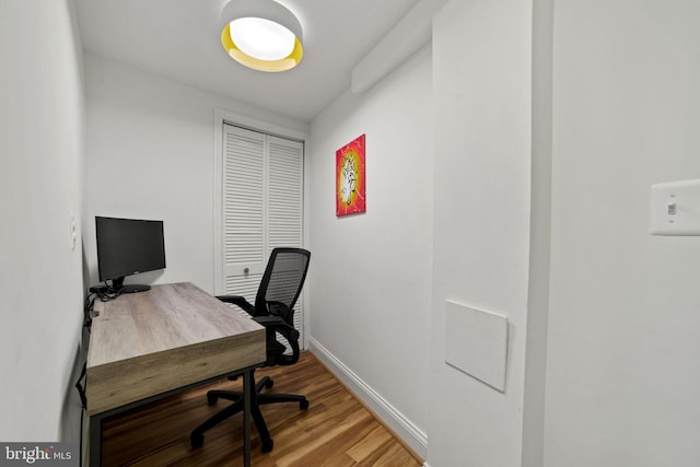 home office with light wood-type flooring