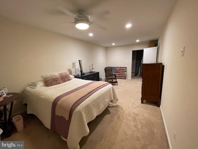 carpeted bedroom with ceiling fan