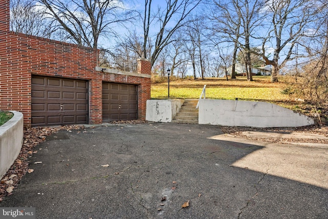 view of yard with a garage