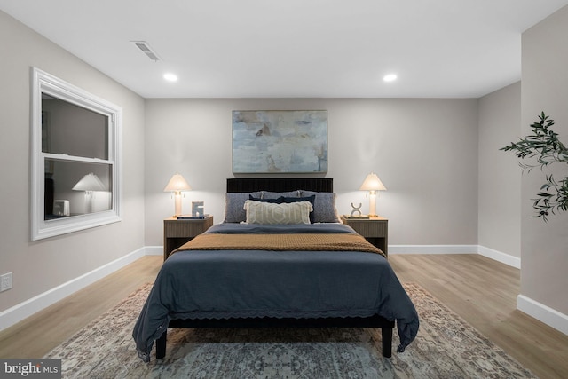 bedroom featuring hardwood / wood-style floors