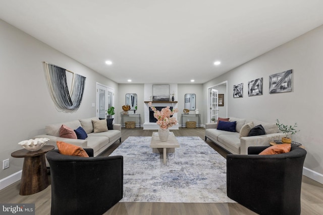 living room with light hardwood / wood-style floors